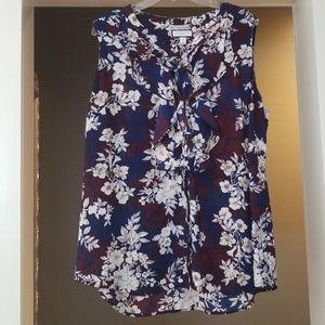 Sleeveless ruffle front blouse